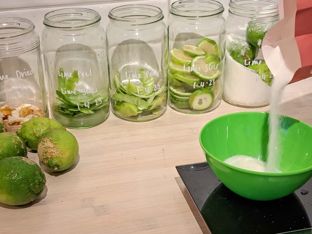 Best Limecello Recipe (We Tested 5 Variations!) 5 Image of DIY Distilling weighing out the sugar